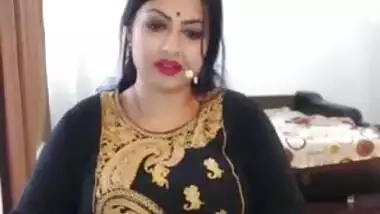 Indian Women Pleasuring herself showing his massive tits