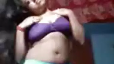 Sexy Desi XXX girl showing her boobs and dancing nude on camera