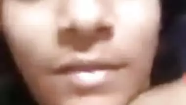 Indian XXX girl showing boobs and playing with nipples on video call