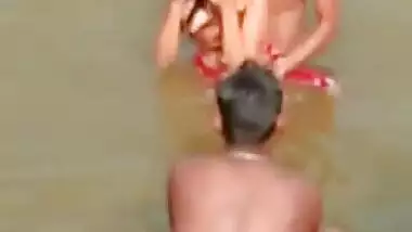 Desi girl enjoying river bath with group of boys