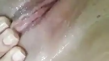 Sexy girl rubbing her pussy