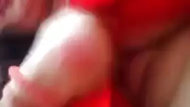 Plump amateur Desi wife in a red sari performs hot XXX striptease