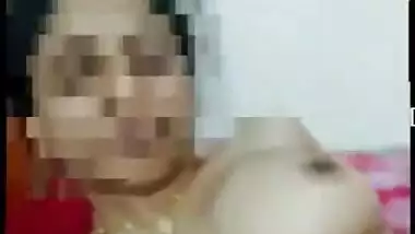 Desi girl exposes XXX boobies and pinches brown nipples holding camera