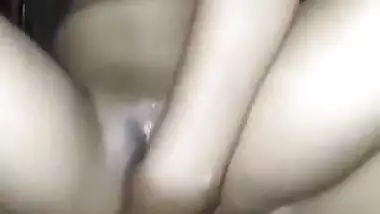 Horny girl masturbating pussy with torchlight MMS