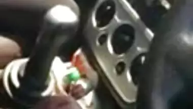 Young desi girl sucking inside car