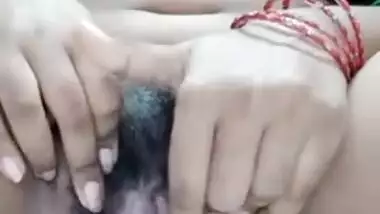 Newly married bhabhi showing her sexy figure and fingering her hairy pussy