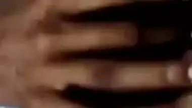 Indian babe with glasses exposes her XXX breast and rubs brown nipple